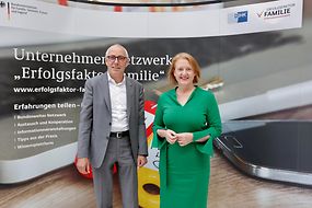 Lisa Paus mit Peter Adrian, Präsident der Deutschen Industrie- und Handelskammer 